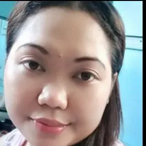 A patient and kind Filipina helper with caregiving skills.