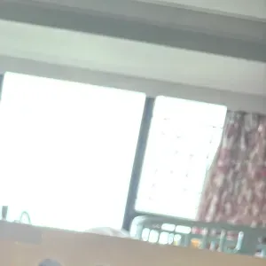 Happy family with three kids and one helper